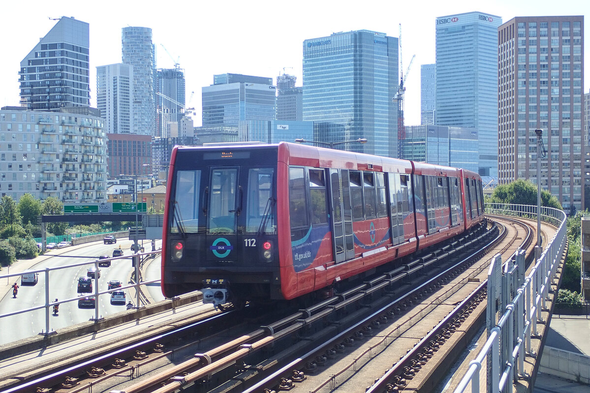 A DLR train departs from East India