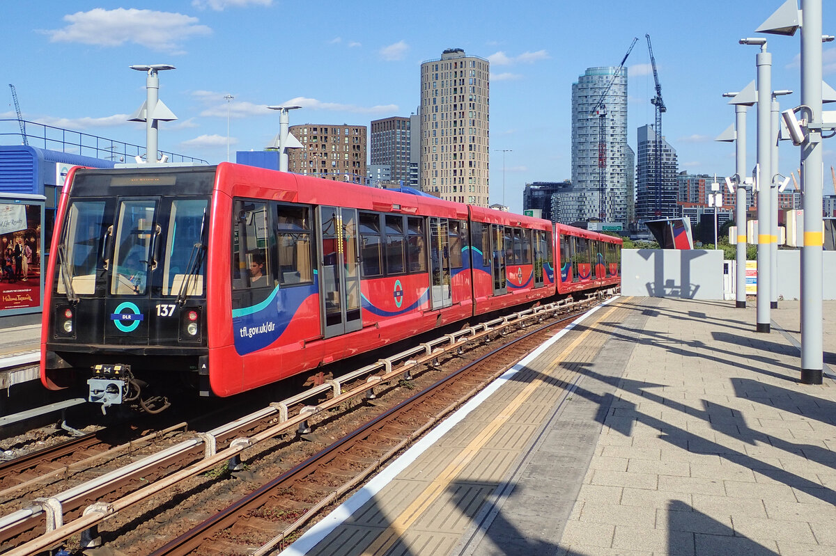 A DLR train departs from Poplar