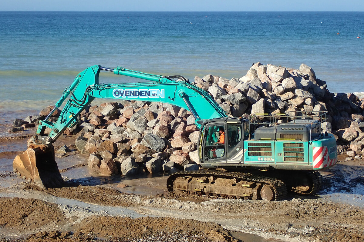 Excavator on Cromer beach