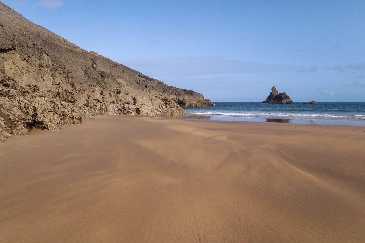 Sand and rocky edge of Broad Haven South beach
