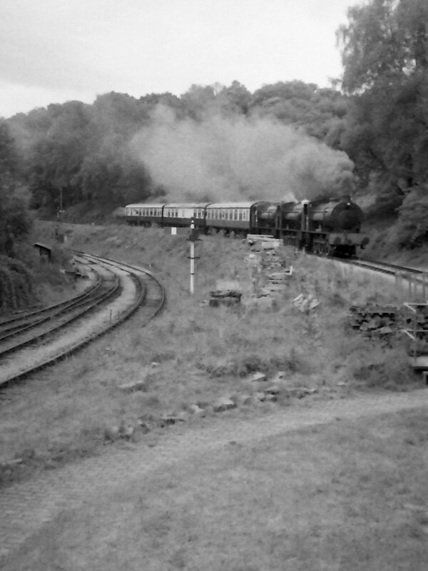 Three Austerity tanks triple head a three coach train to Norchard High Level